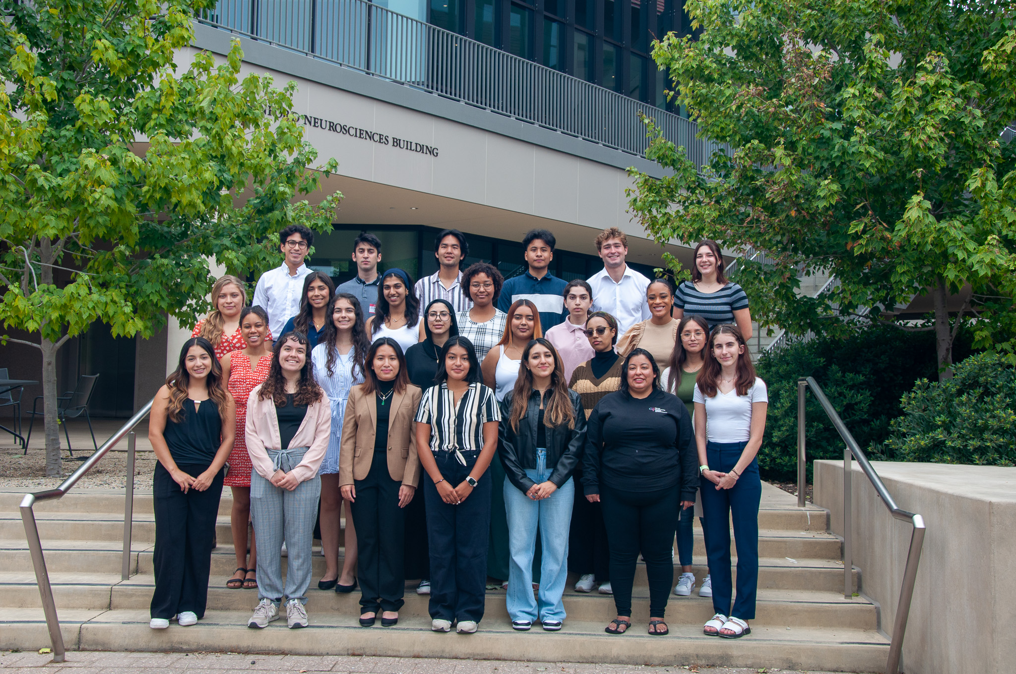 2023 NeURO Fellows share a picture in front of the Stanford Neurosciences Building. Photo by Julia Diaz.