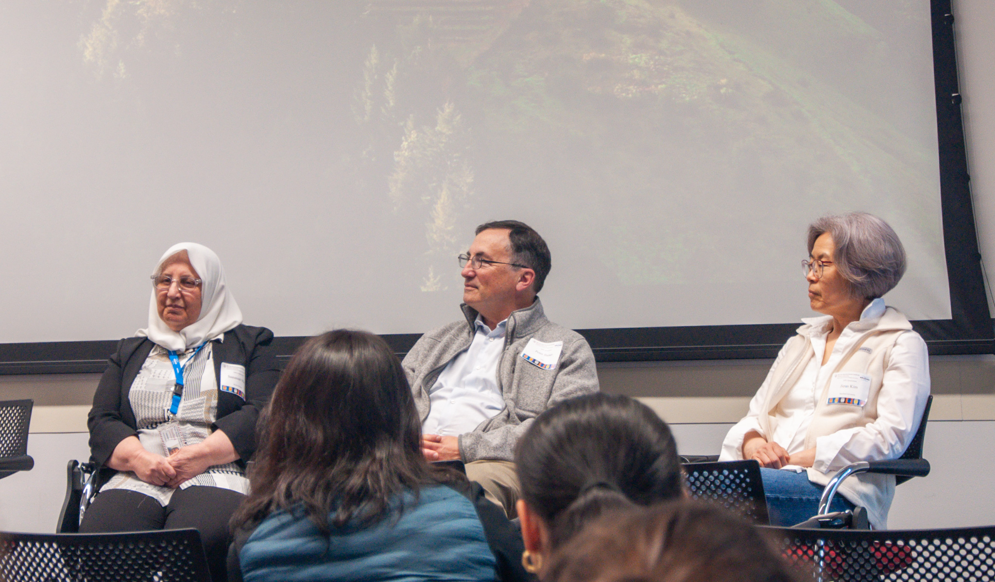 Panelists (l-r) Saaussan Madi, Peter Basser, Jieun Kim, and Jin Hyung Lee (not pictured) discuss the many ways scientists can use MRI to advance basic and translational neuroscience research. Photo by Julia Diaz.