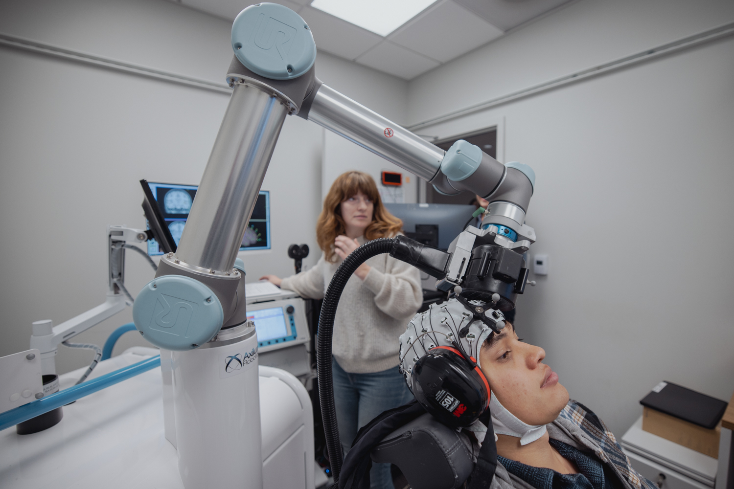 Milena Kaestner conducts TMS study in Koret Human Neurosciences Lab