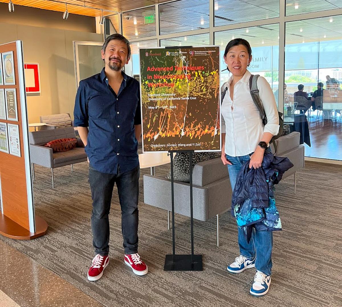 Organizers Gordon Wang and Yi Zuo attend a lecture for their workshop in Santa Cruz.
