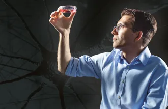 Sergiu Pasca holding brain organoids 