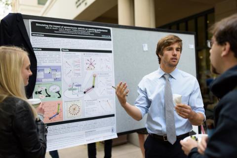 Stanford Interdisciplinary Graduate Fellow shares his research on "Simulating the impact of sensorimotor deficits on reaching performance" at a poster session. 