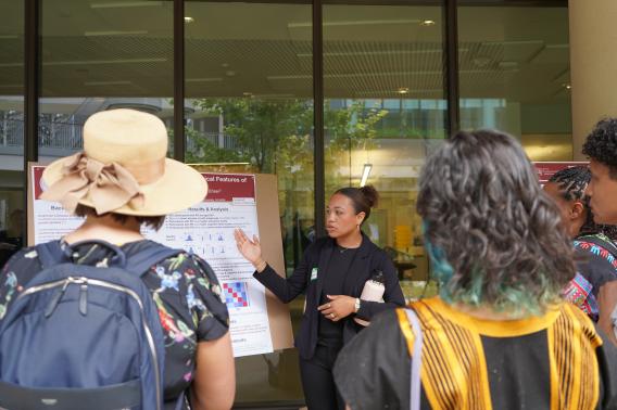 Eliana Randazzo Ridley, a 2024 NeURO-CC fellow, presents at the 2024 poster session