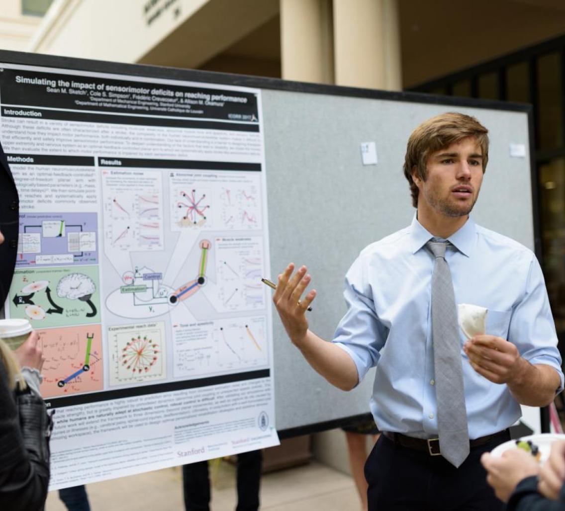 Stanford Interdisciplinary Graduate Fellow shares his research on "Simulating the impact of sensorimotor deficits on reaching performance" at a poster session. 